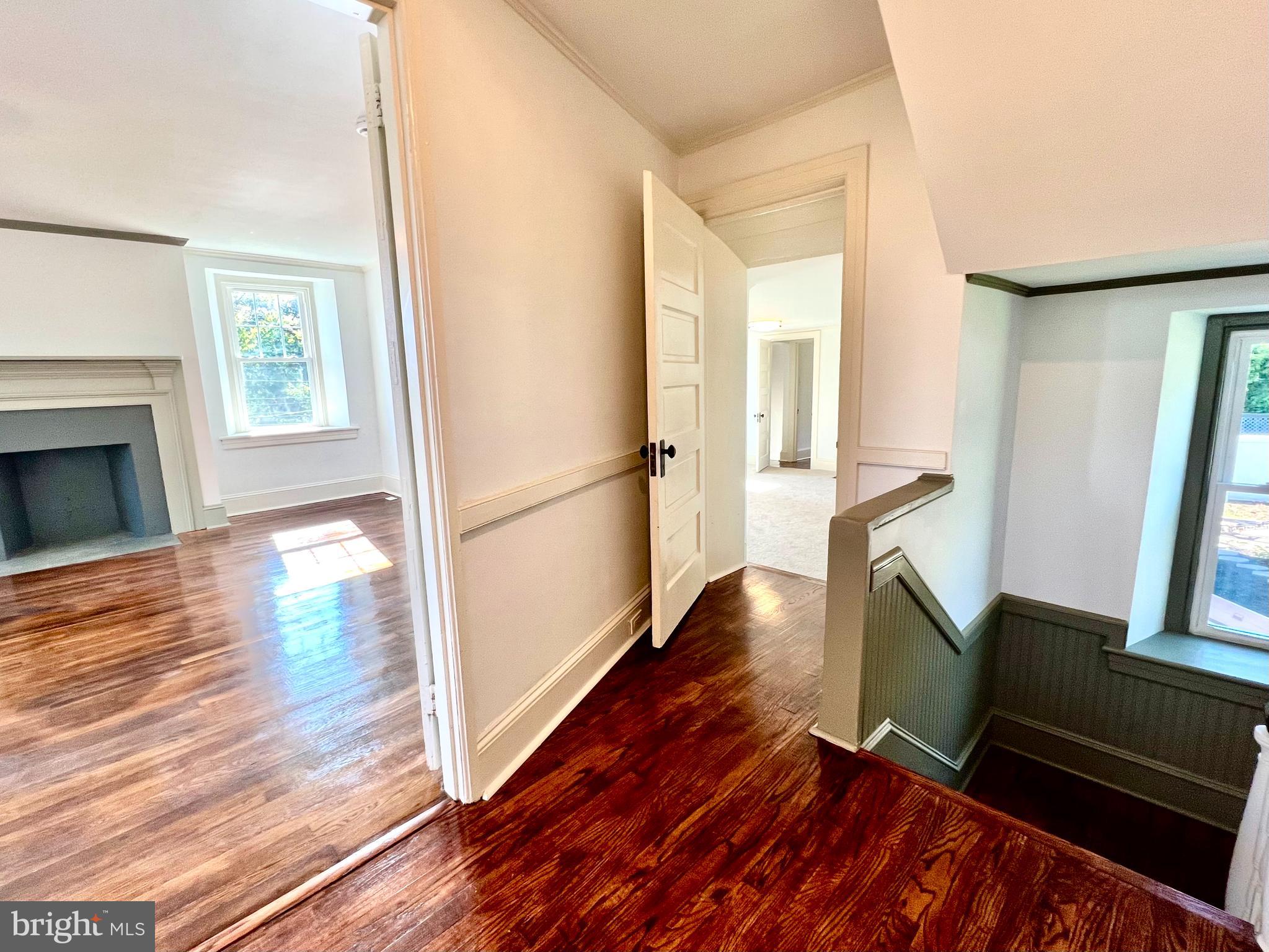 2437 Patane Avenue Abington, PA 19001 - Photo 35 of 69 a view of a living room with wooden floor and a fireplace