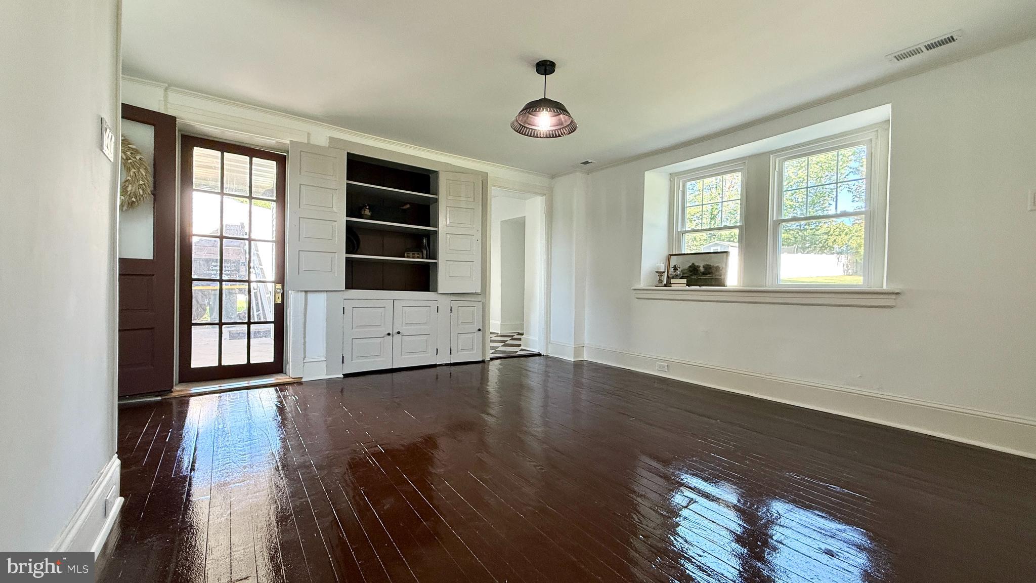 2437 Patane Avenue Abington, PA 19001 - Photo 5 of 69 an empty room with wooden floor and windows