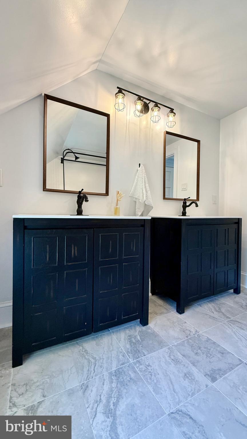 2437 Patane Avenue Abington, PA 19001 - Photo 64 of 69 a bathroom with a sink and a mirror