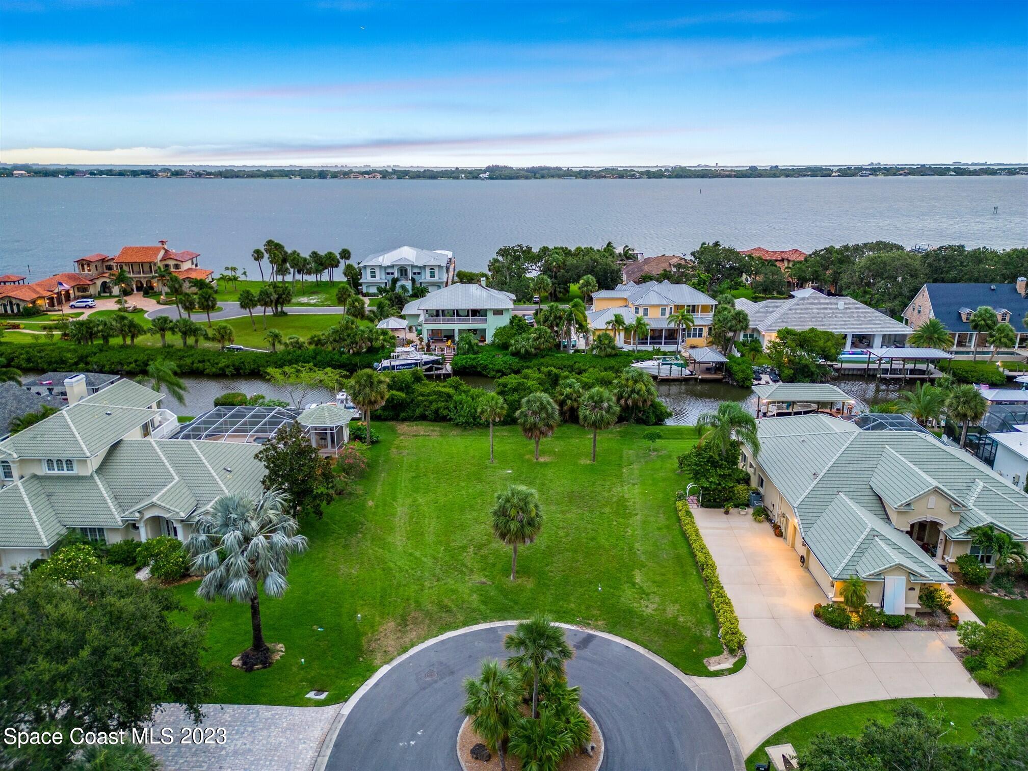 520 Bosun Court Rockledge, FL 32955 - Photo 2 of 20 an aerial view of a city with lawn chairs