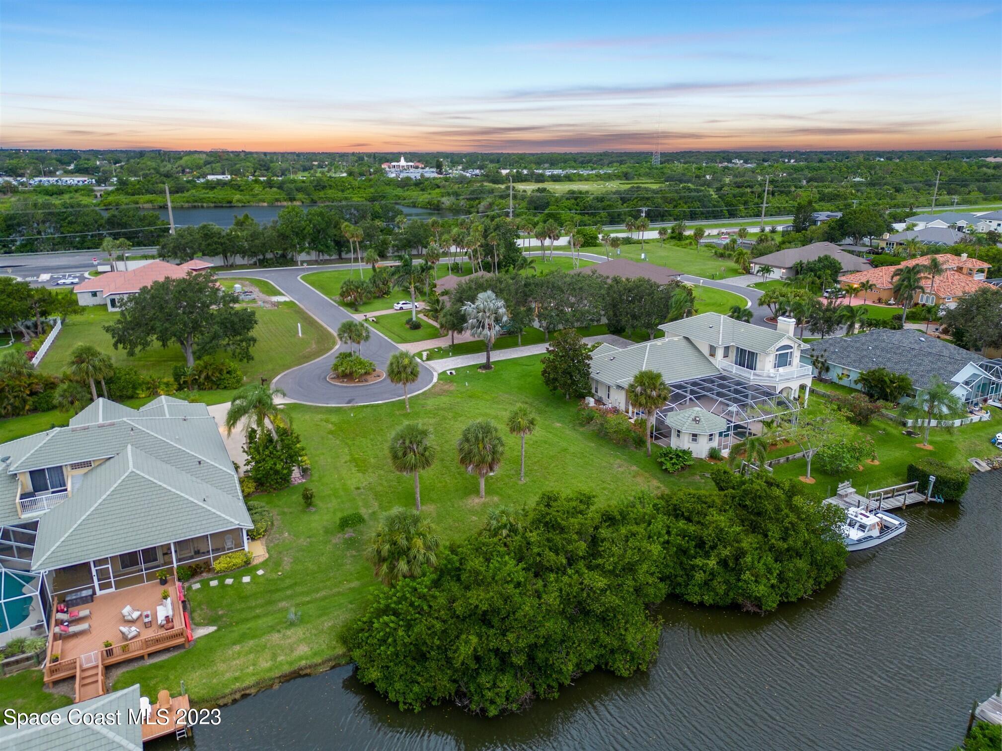 520 Bosun Court Rockledge, FL 32955 - Photo 4 of 20 an aerial view of residential houses with outdoor space and street view