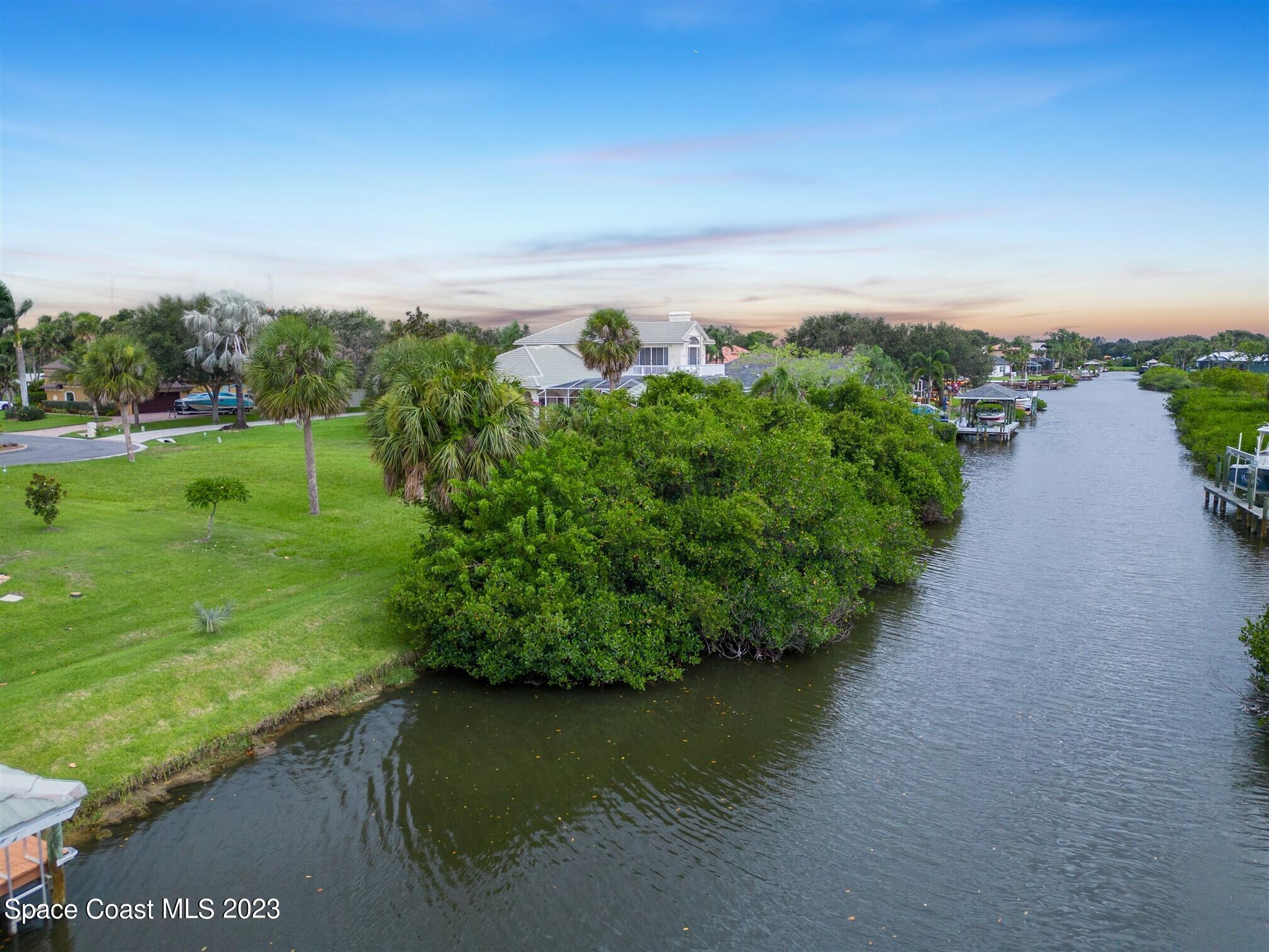 520 Bosun Court Rockledge, FL 32955 - Photo 10 of 20 a view of a lake with a city