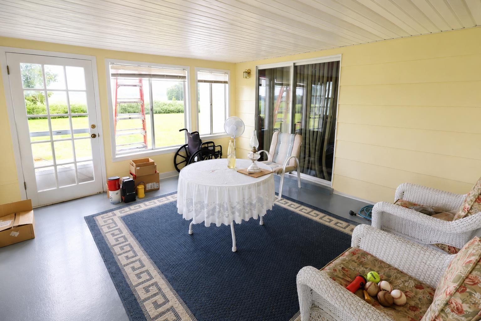 2000 Culbreath Road Covington, TN 38019 - Photo 13 of 16 Sunroom featuring multiple windows, a glass-paned door, and a sliding glass door