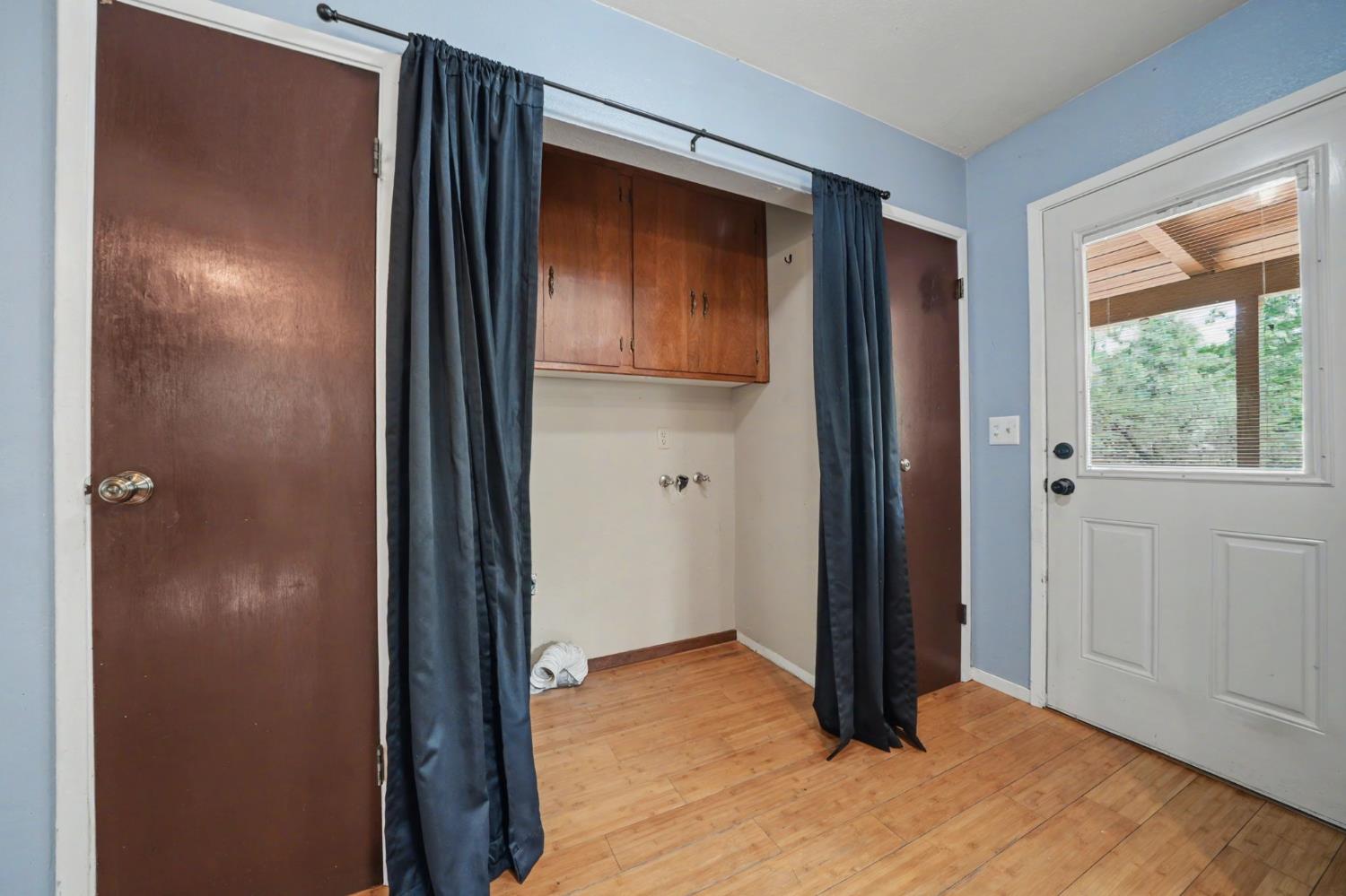 19479 Murphy Road Pine Grove, CA 95665 - Photo 17 of 43 a view of a hallway with wooden floor and closet