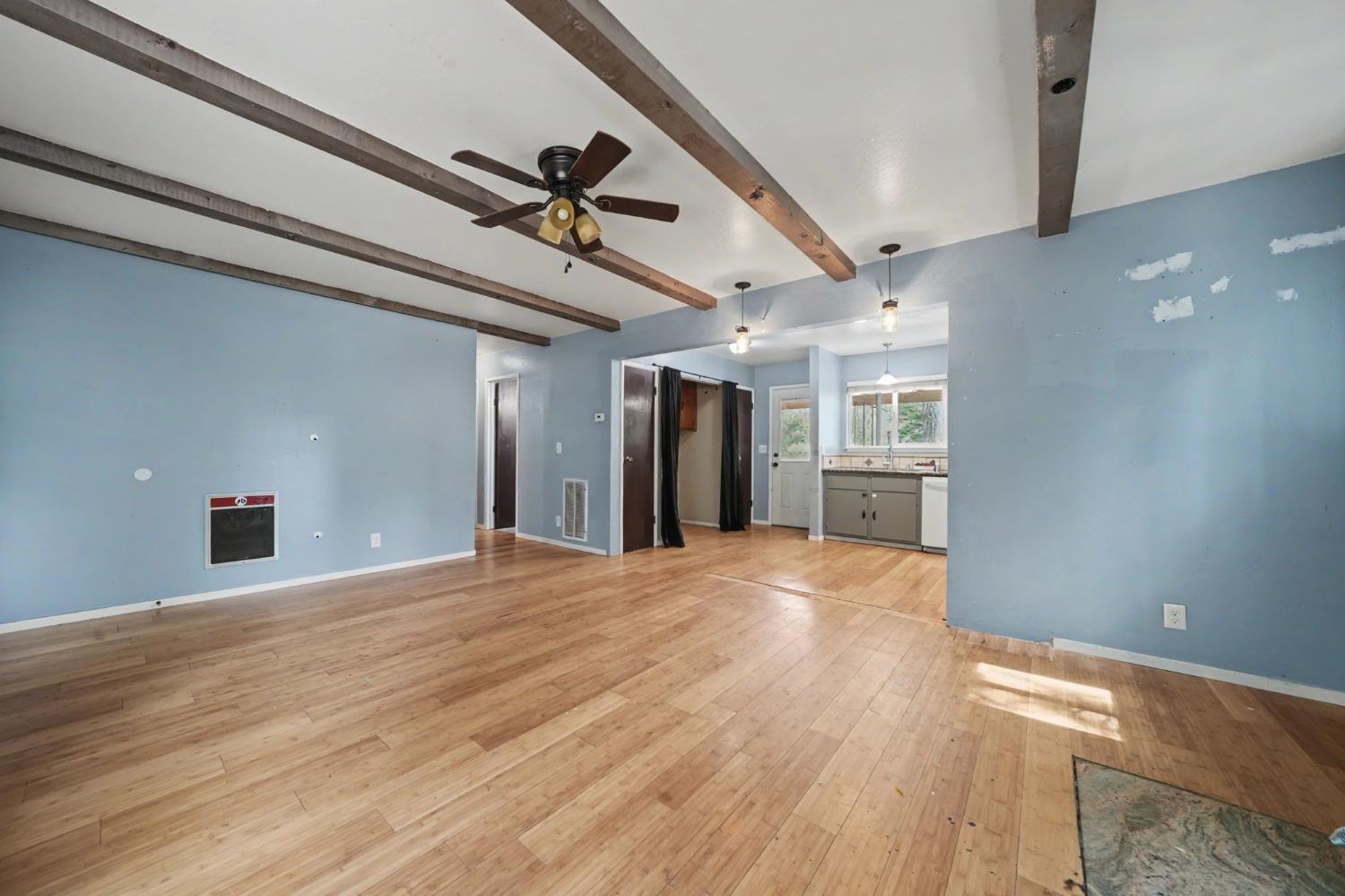 19479 Murphy Road Pine Grove, CA 95665 - Photo 21 of 43 a view of an empty room with wooden floor and a window