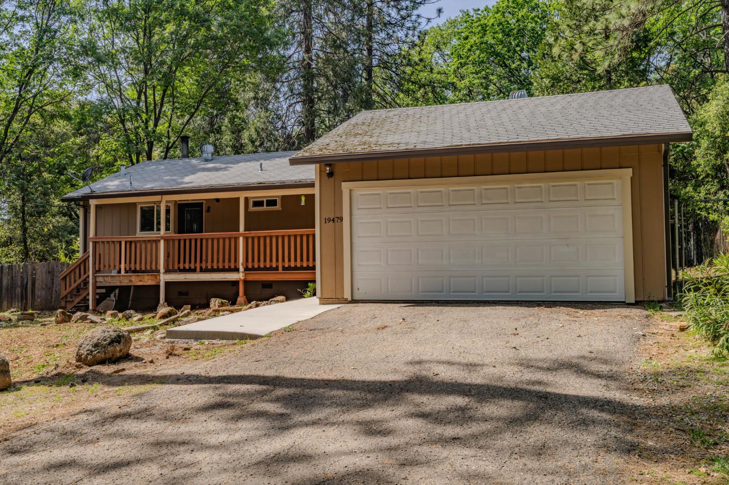 19479 Murphy Road Pine Grove, CA 95665 - Photo 3 of 43 a front view of a house with a yard and garage