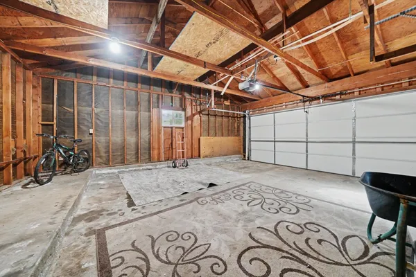 a view of a room with wooden walls