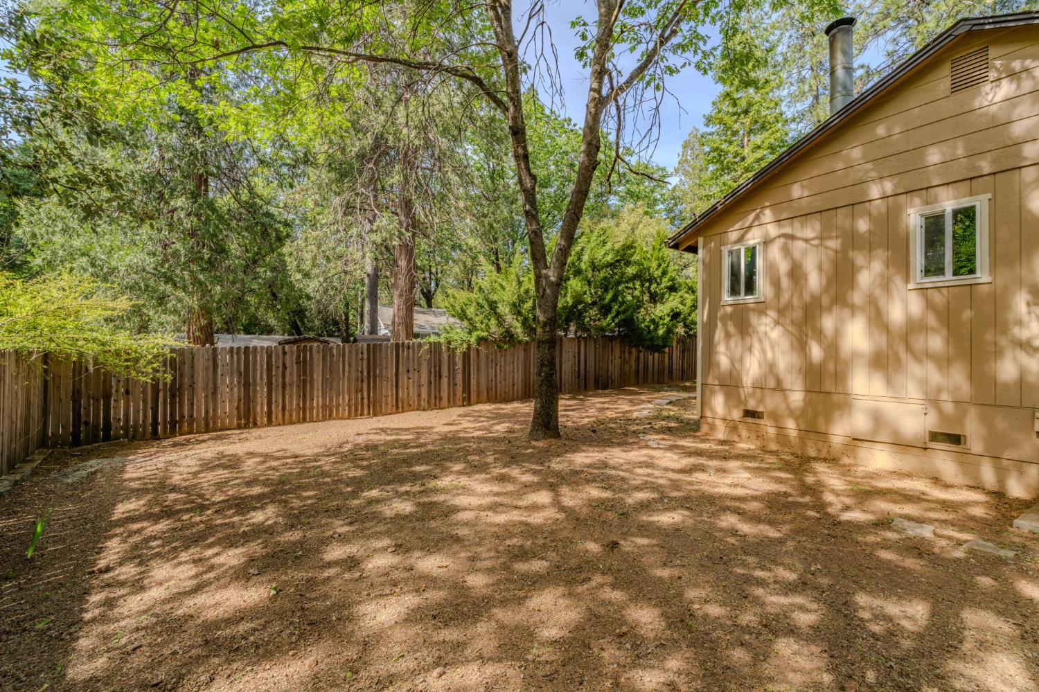 19479 Murphy Road Pine Grove, CA 95665 - Photo 34 of 43 a backyard of a house with lots of green space