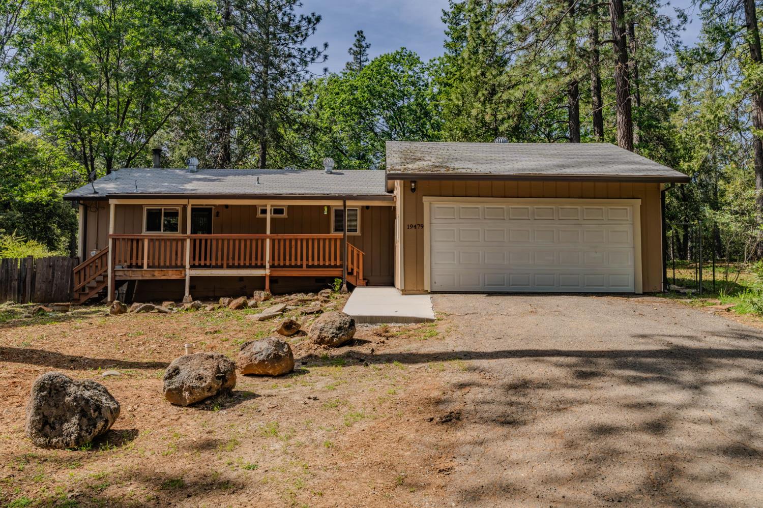19479 Murphy Road Pine Grove, CA 95665 - Photo 5 of 43 a front view of a house with a yard and garage