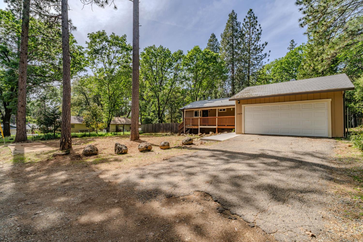 19479 Murphy Road Pine Grove, CA 95665 - Photo 7 of 43 a view of a house with backyard and trees