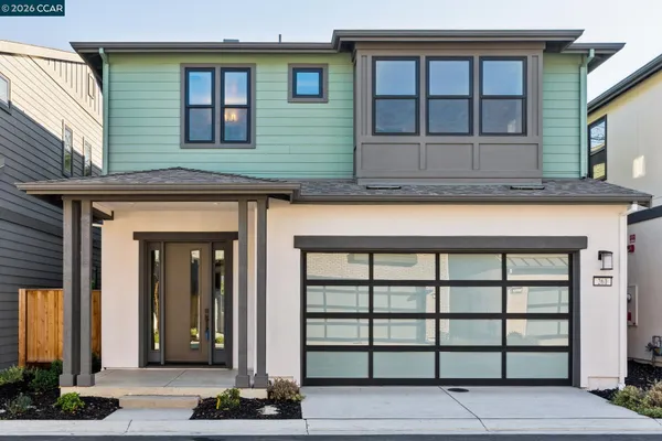 a front view of a house with a glass windows