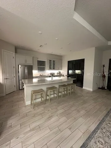 a view of kitchen with breakfast area