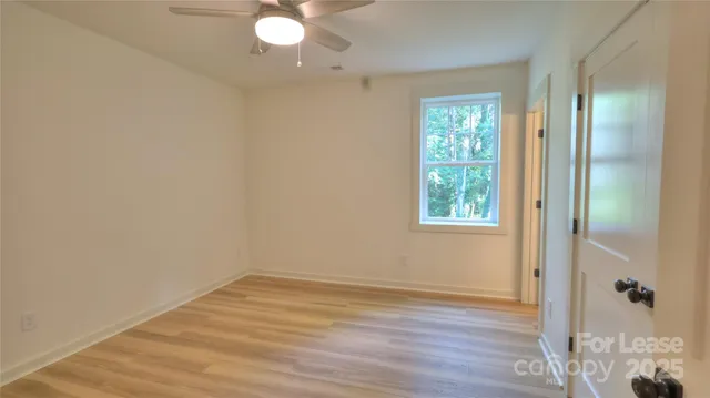 a bathroom with a tub sink and shower