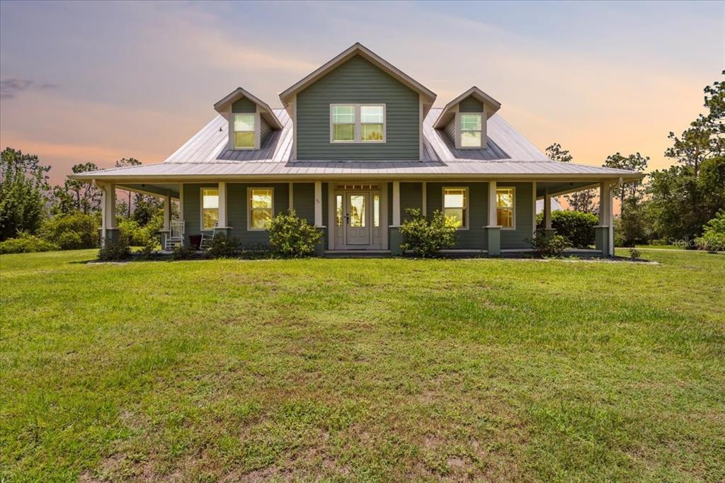 5242 Blackjack Circle Punta Gorda, FL 33982 - Photo 1 of 1 a front view of a house with a yard