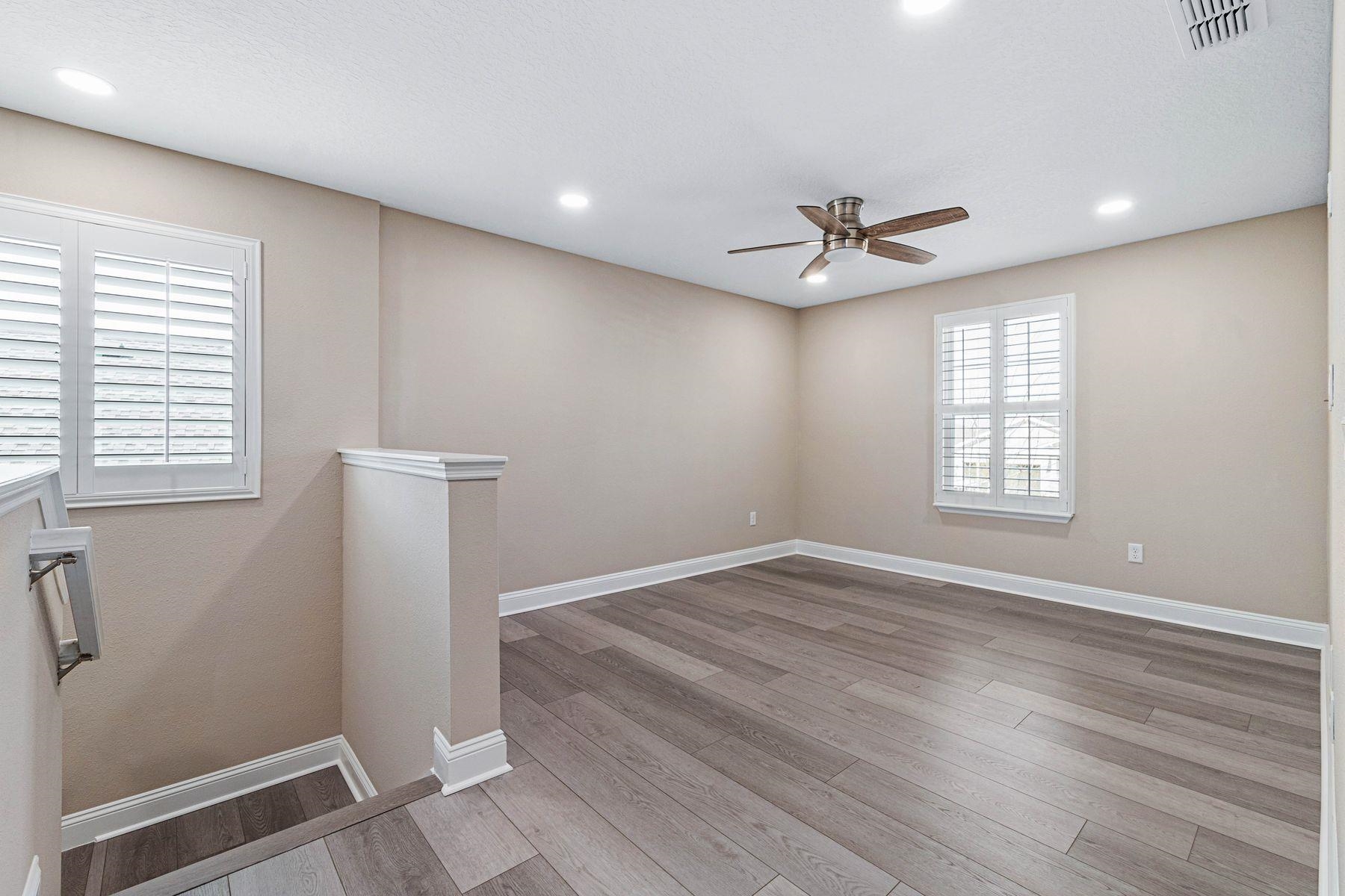 91 Ridgewind Drive St. Augustine, FL 32092 - Photo 17 of 49 a view of an empty room with a window