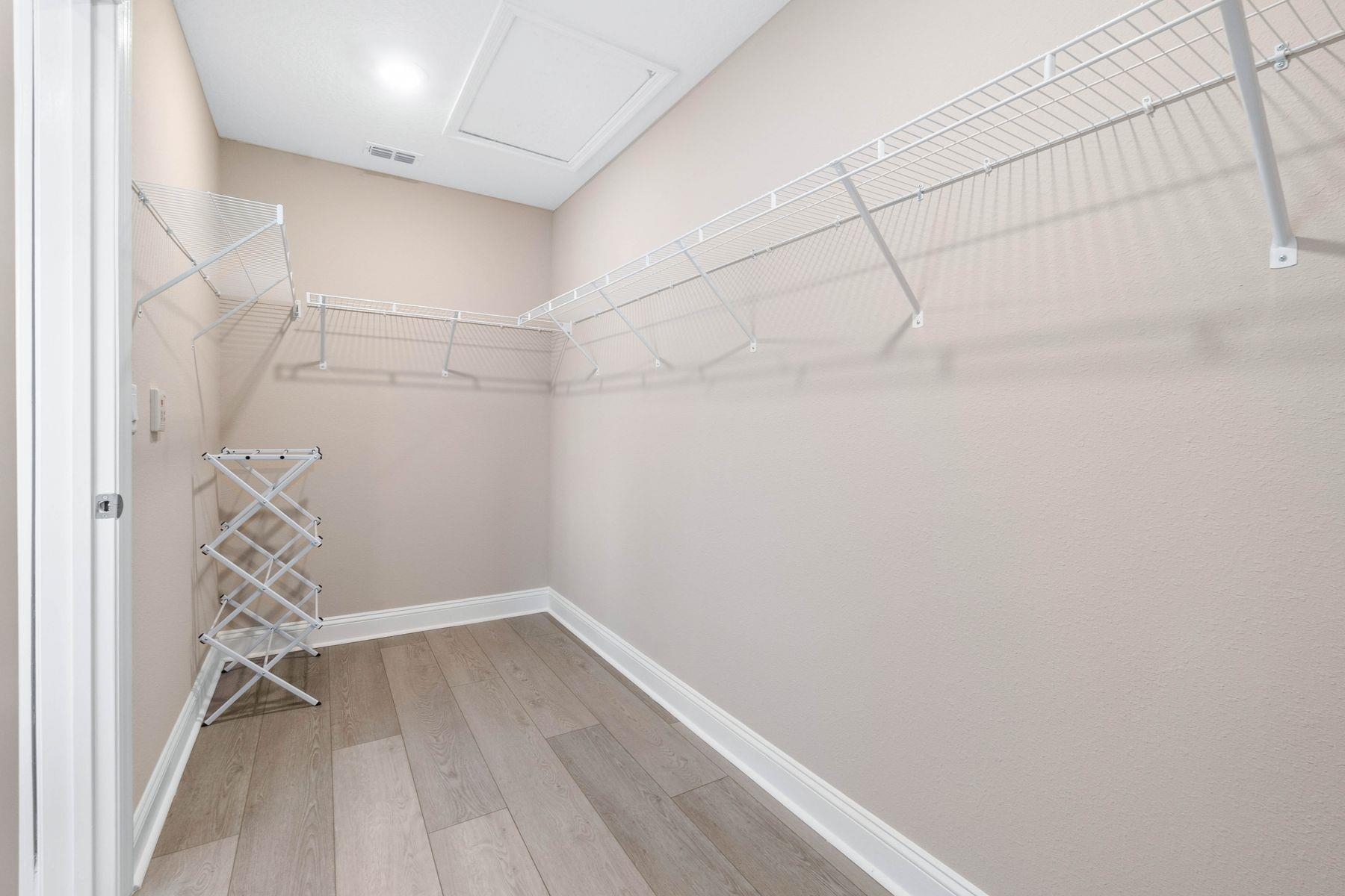 91 Ridgewind Drive St. Augustine, FL 32092 - Photo 25 of 49 a view of a room with racks on the wall