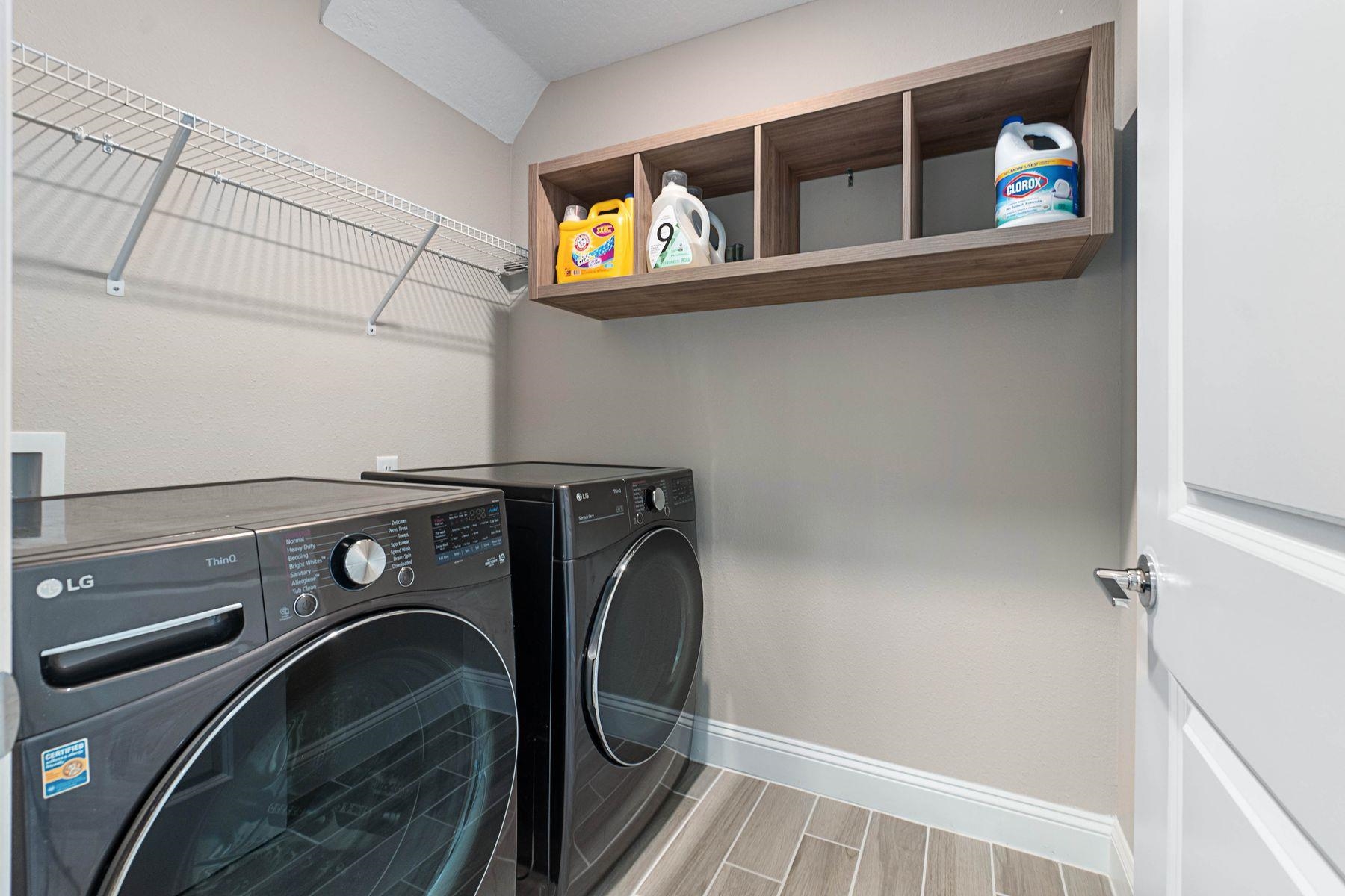 91 Ridgewind Drive St. Augustine, FL 32092 - Photo 31 of 49 a utility room with dryer and washer