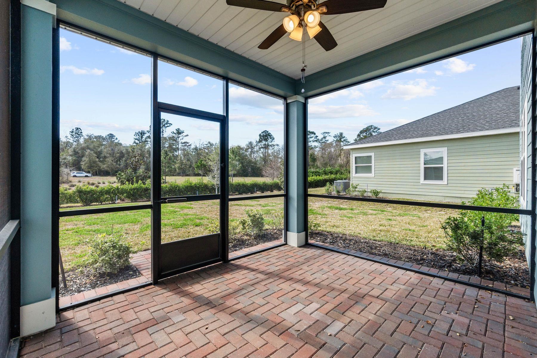 91 Ridgewind Drive St. Augustine, FL 32092 - Photo 32 of 49 a view of a room with wooden floor and balcony