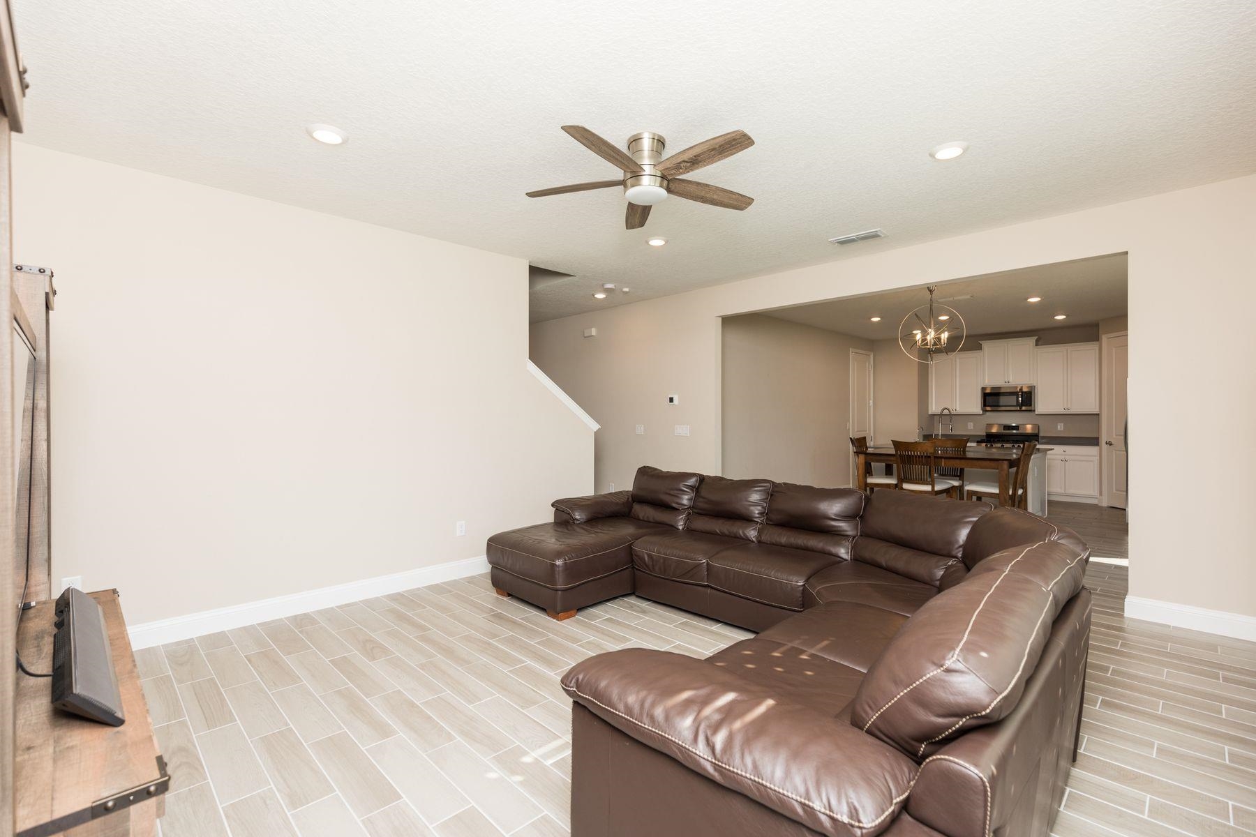 91 Ridgewind Drive St. Augustine, FL 32092 - Photo 10 of 49 a living room with furniture and a wooden floor