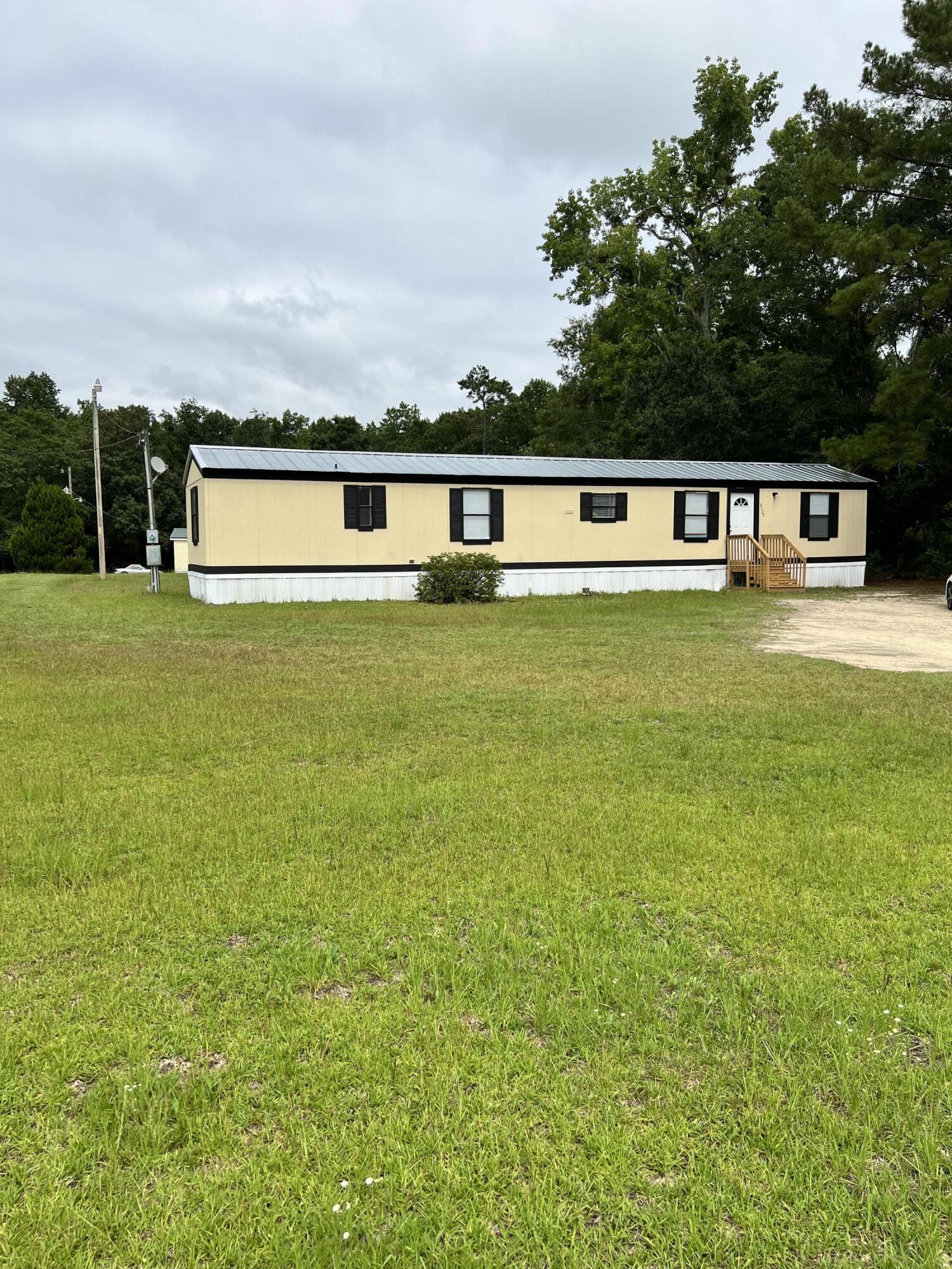 2127 Tee Vee Road Elloree, SC 29047 - Photo 1 of 27 2B7F8CEF-B5F6-4C6F-96C8-9CB46604FDDA