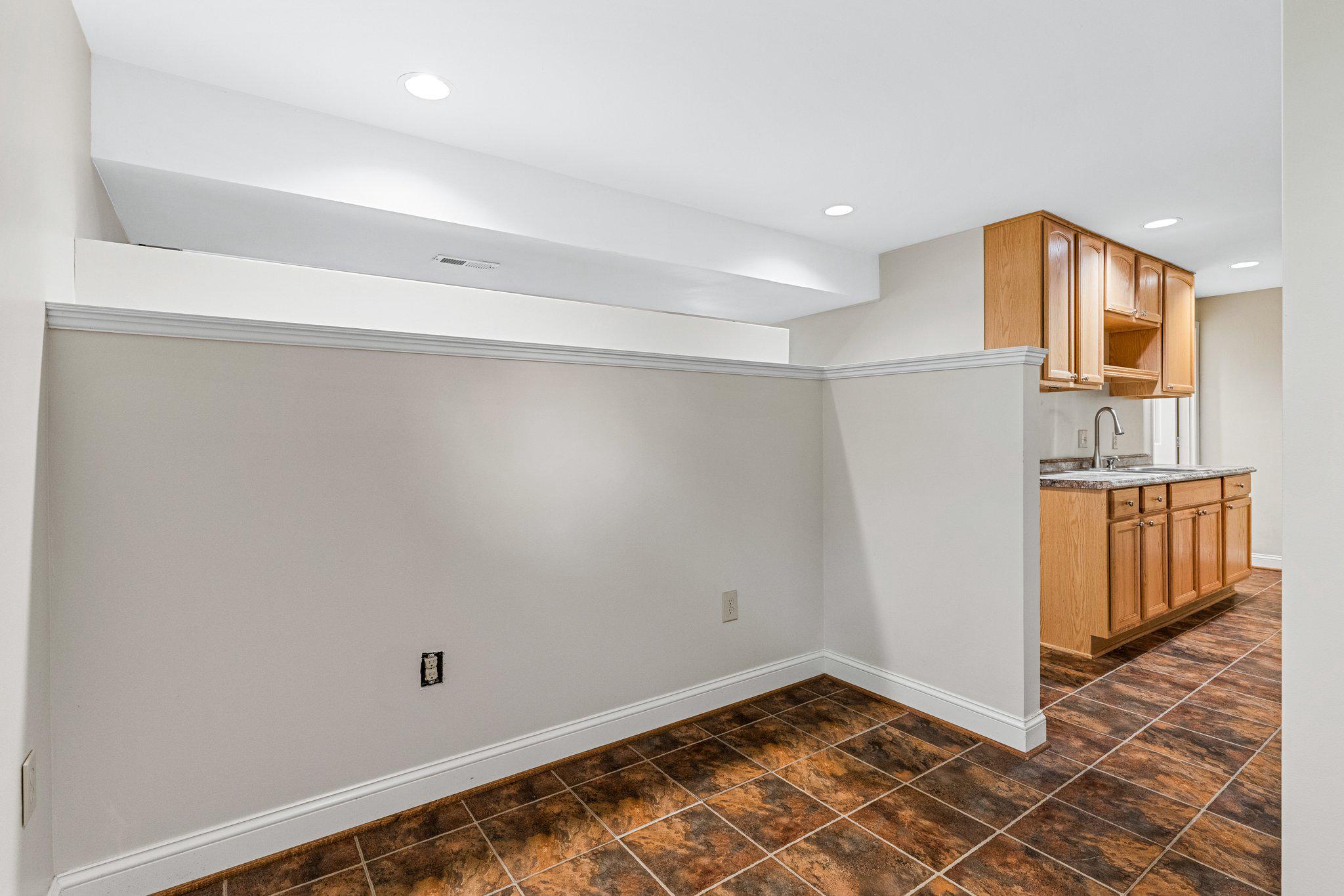 12400 Triple Crown Road Gaithersburg, MD 20878 - Photo 30 of 45 Flexible Basement Living Space