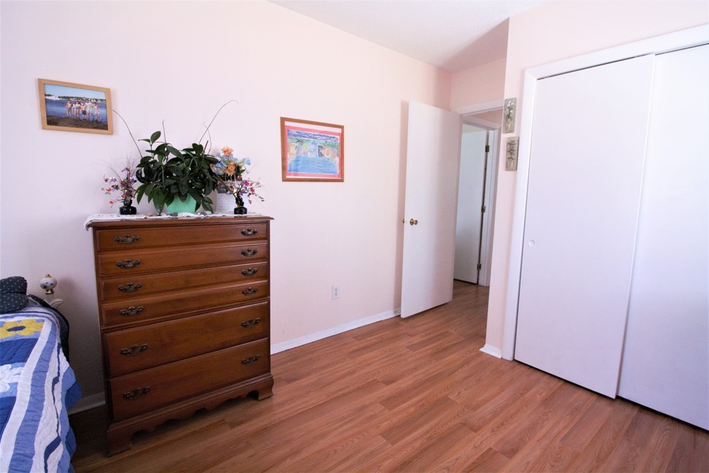 27 Round House Road, Unit 27 Bourne, MA 02532 - Photo 10 of 13 a view of room with wooden floor