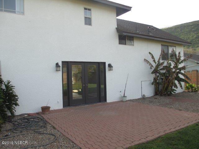 233 Huntington Place Lompoc, CA 93436 - Photo 2 of 7 a view of a house with a potted plant