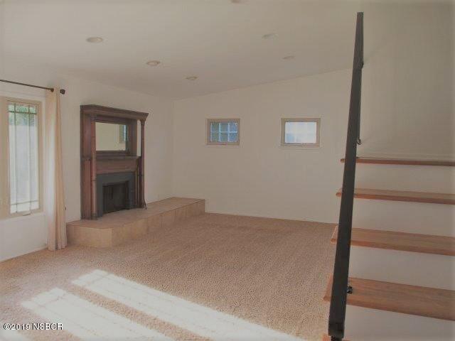 233 Huntington Place Lompoc, CA 93436 - Photo 4 of 7 a view of an empty room with a window