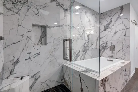 a bathroom with a sink vanity and a mirror
