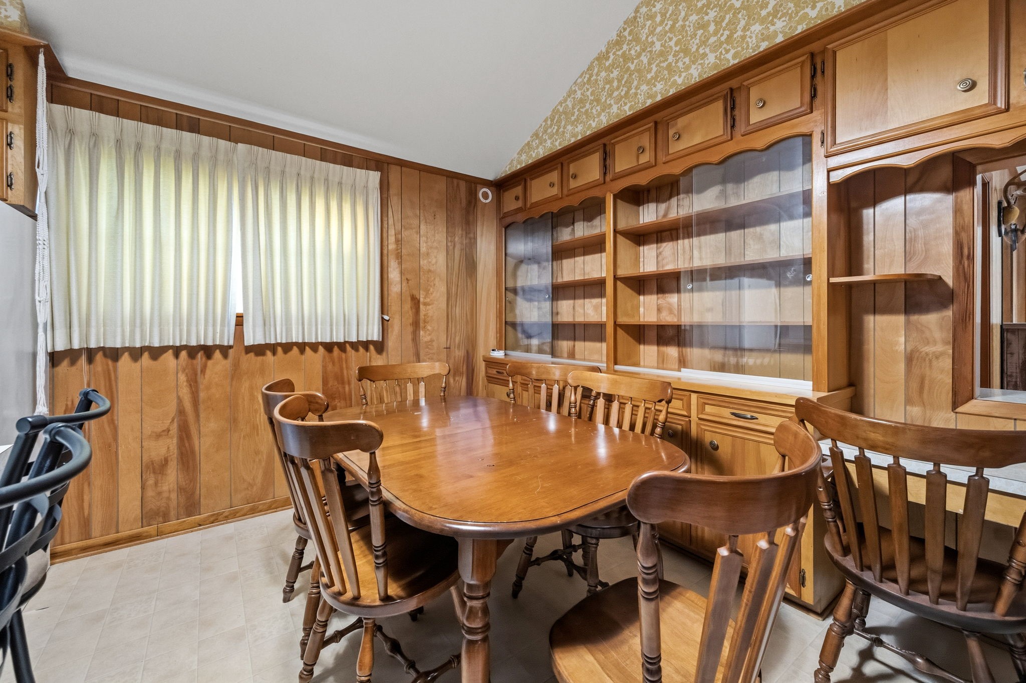 804 North Cleveland Street Dayton, TX 77535 - Photo 15 of 29 a view of a dining room with furniture and chandelier