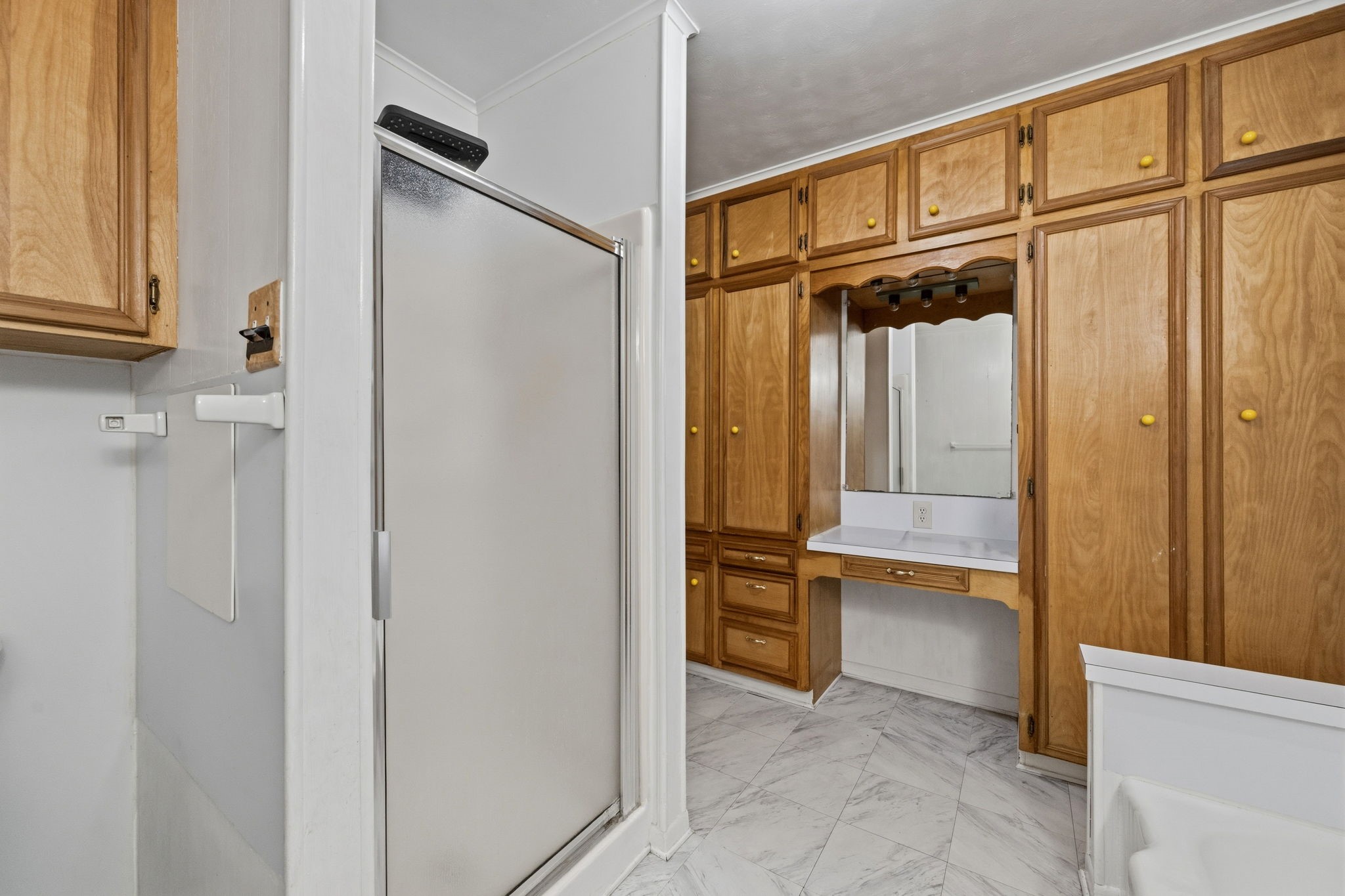 804 North Cleveland Street Dayton, TX 77535 - Photo 19 of 29 a view of walk in closet with empty racks