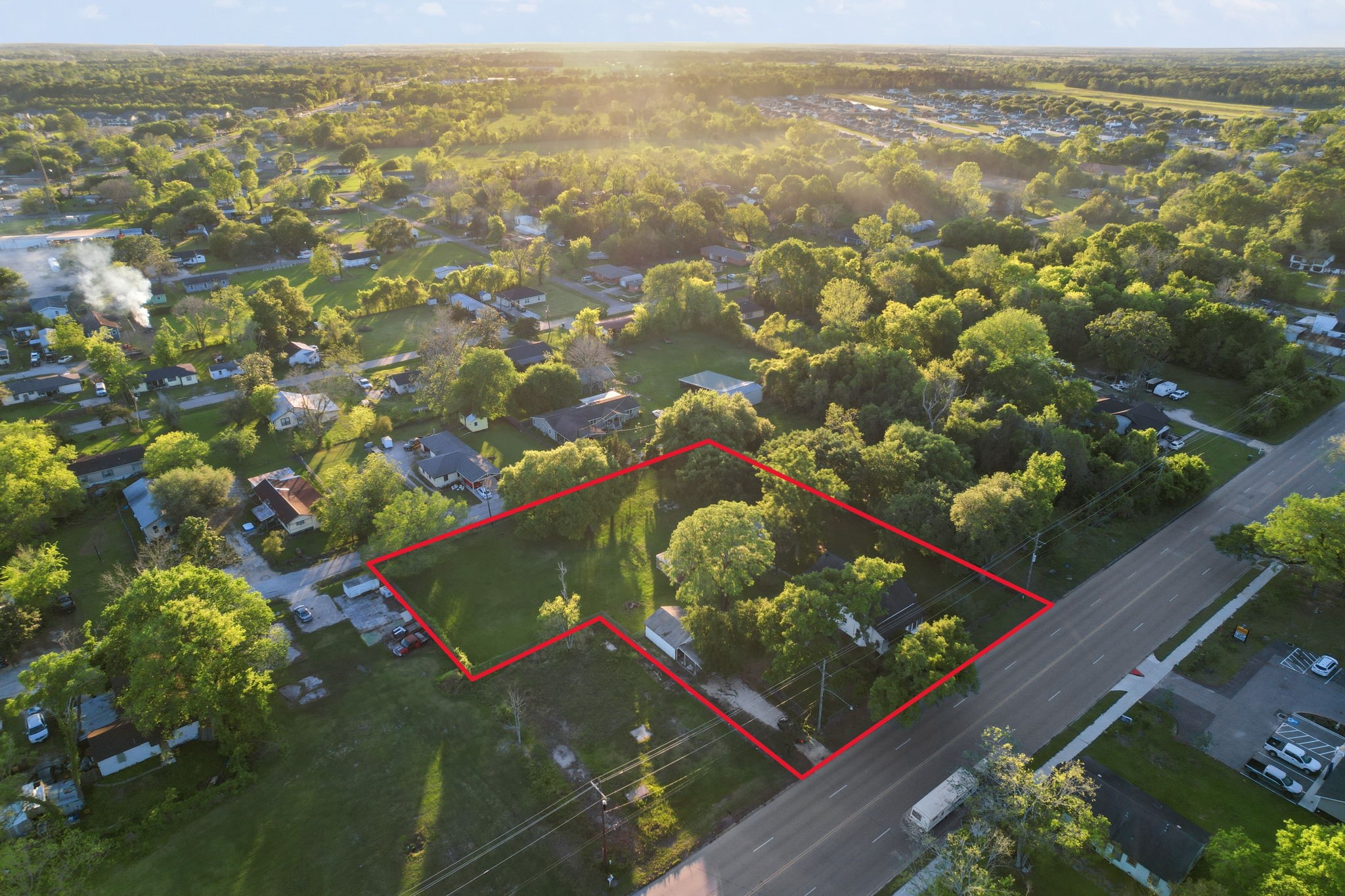 804 North Cleveland Street Dayton, TX 77535 - Photo 2 of 29 an aerial view of residential houses with outdoor space