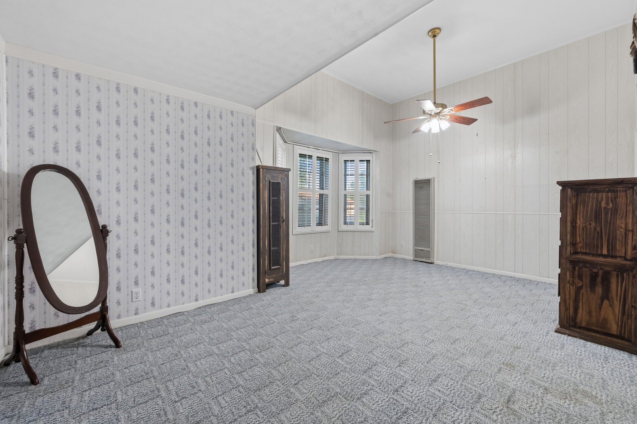804 North Cleveland Street Dayton, TX 77535 - Photo 23 of 29 a view of an empty room with window wooden floor and a chandelier