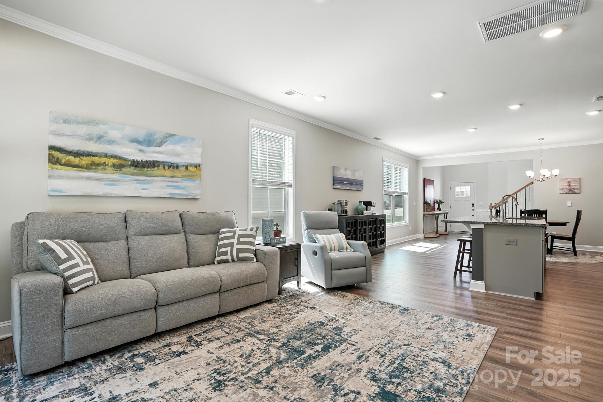 7882 Iron Road Sherrills Ford, NC 28673 - Photo 18 of 46 a living room with furniture wooden floor and a dining table