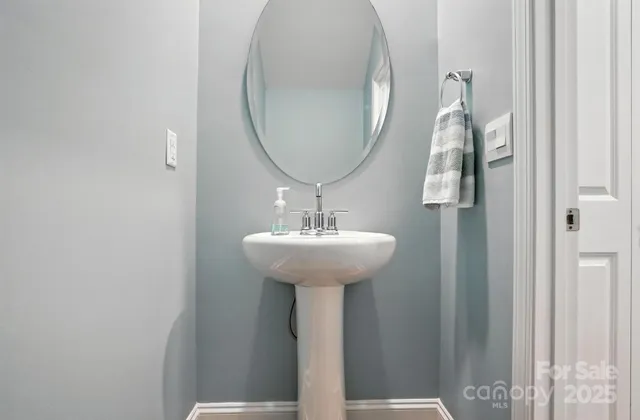 a spacious bedroom with a bed and a window