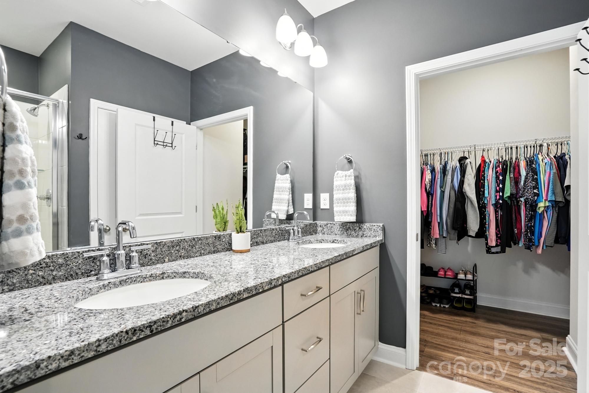 7882 Iron Road Sherrills Ford, NC 28673 - Photo 23 of 46 a bathroom with a sink double vanity and a mirror