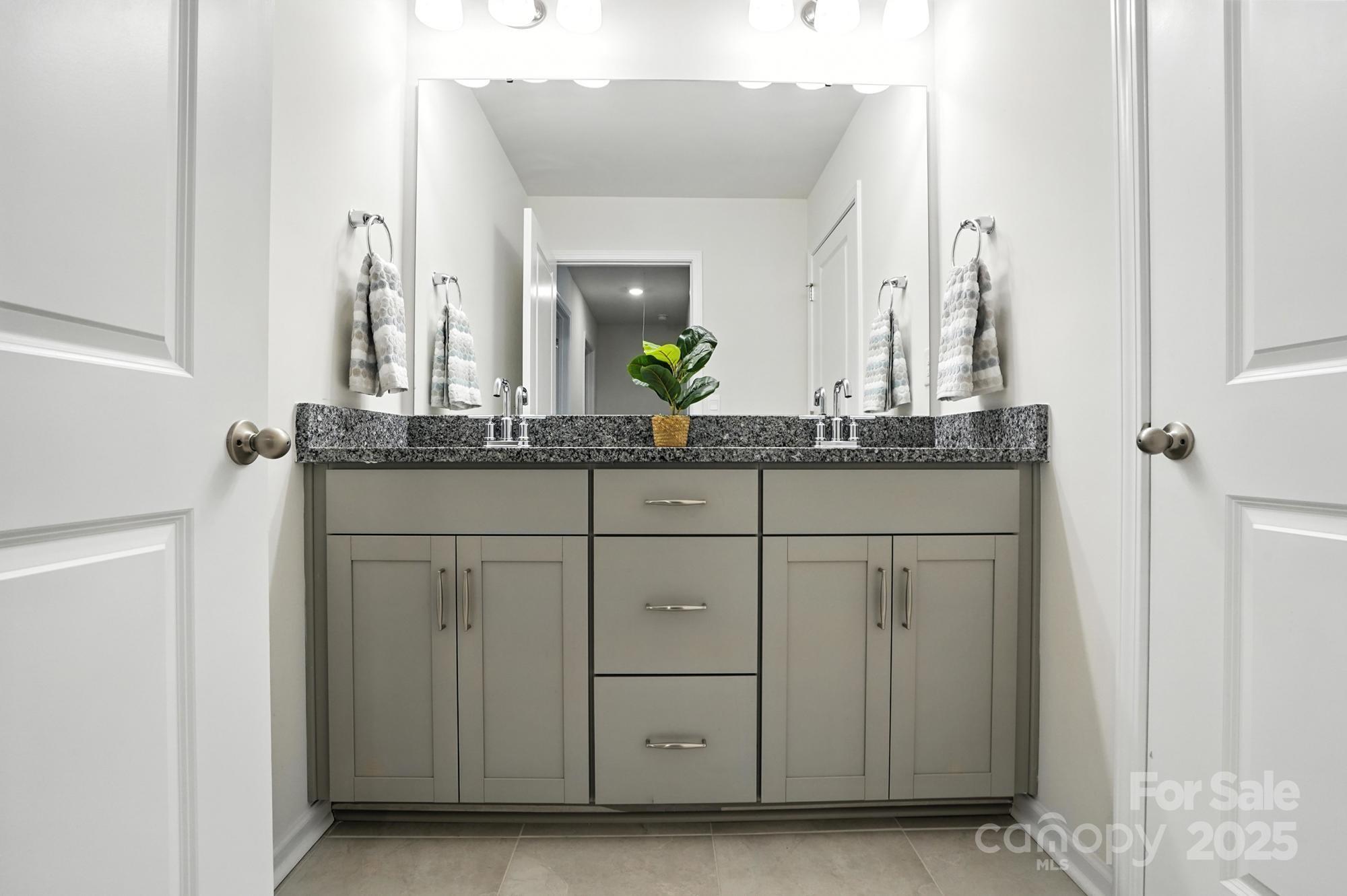 7882 Iron Road Sherrills Ford, NC 28673 - Photo 39 of 46 a bathroom with a sink and a mirror