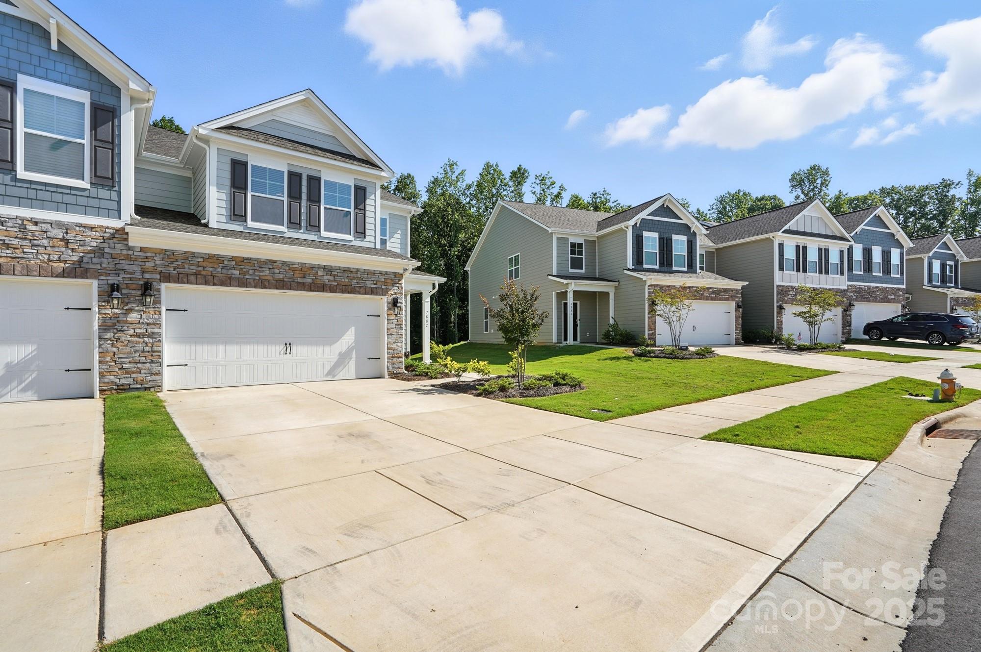 7882 Iron Road Sherrills Ford, NC 28673 - Photo 46 of 46 a front view of a house with a yard and garage