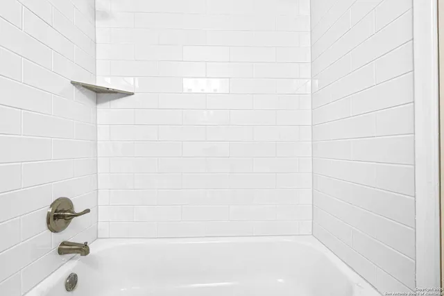 a bathroom with a bathtub