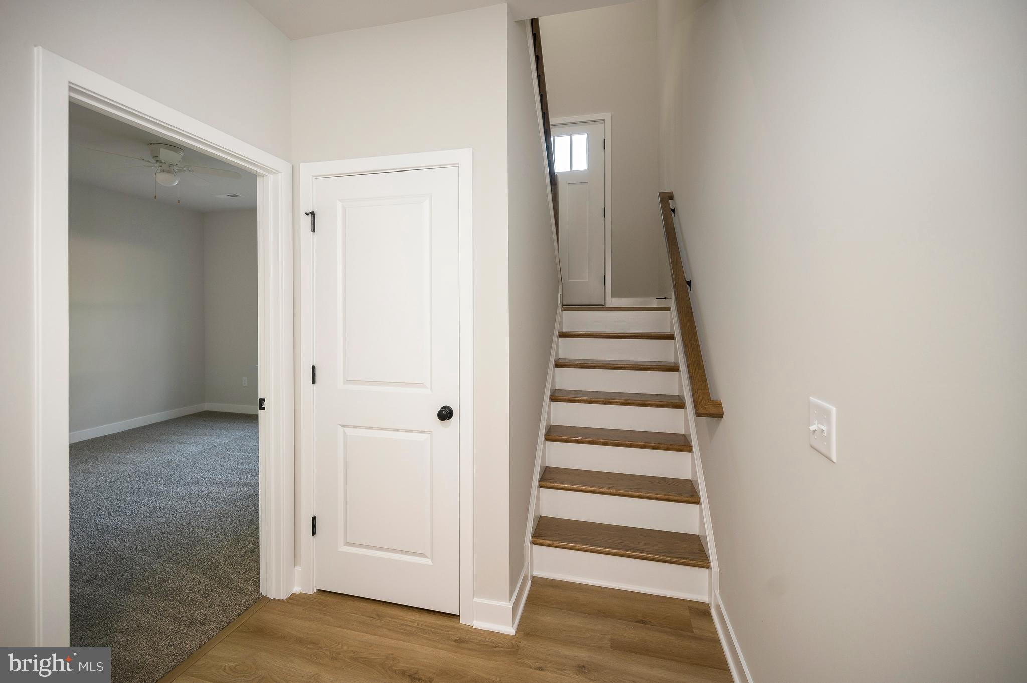 3145 Lewiston Road Bumpass, VA 23024 - Photo 36 of 44 a view of a hallway with wooden floor and entryway