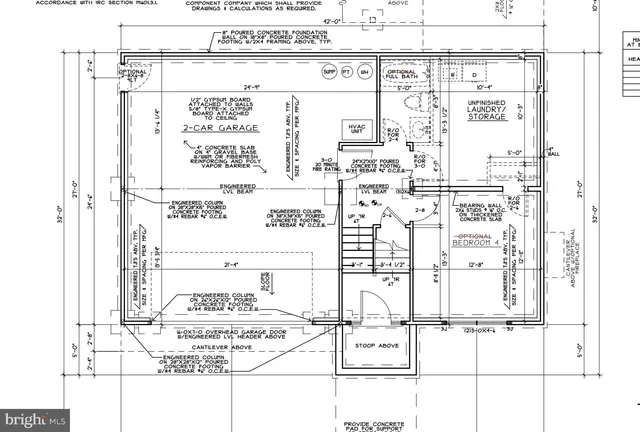 a black and white photo of a bedroom