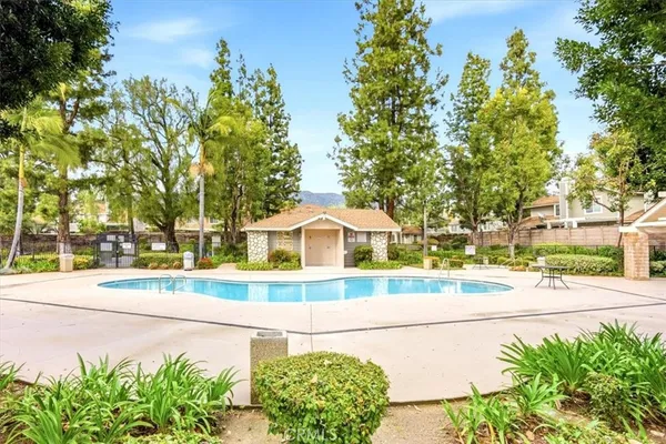 a view of a yard and front view of a house