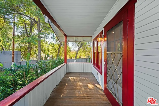 a view of a living room filled with furniture