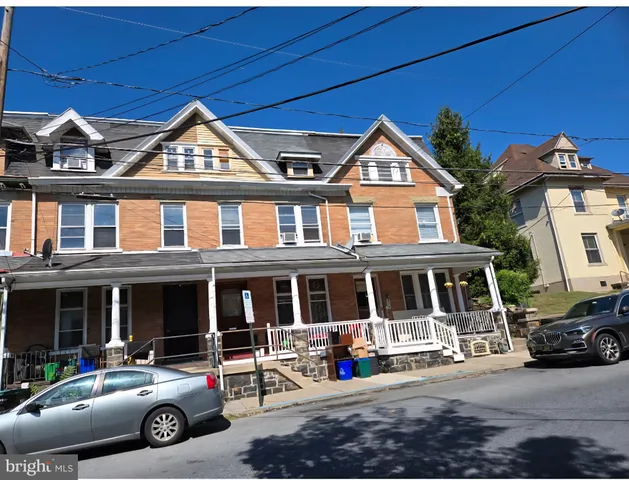 a car parked in front of a house
