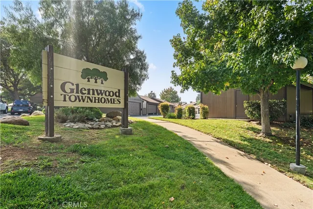 a view of a street with sign board