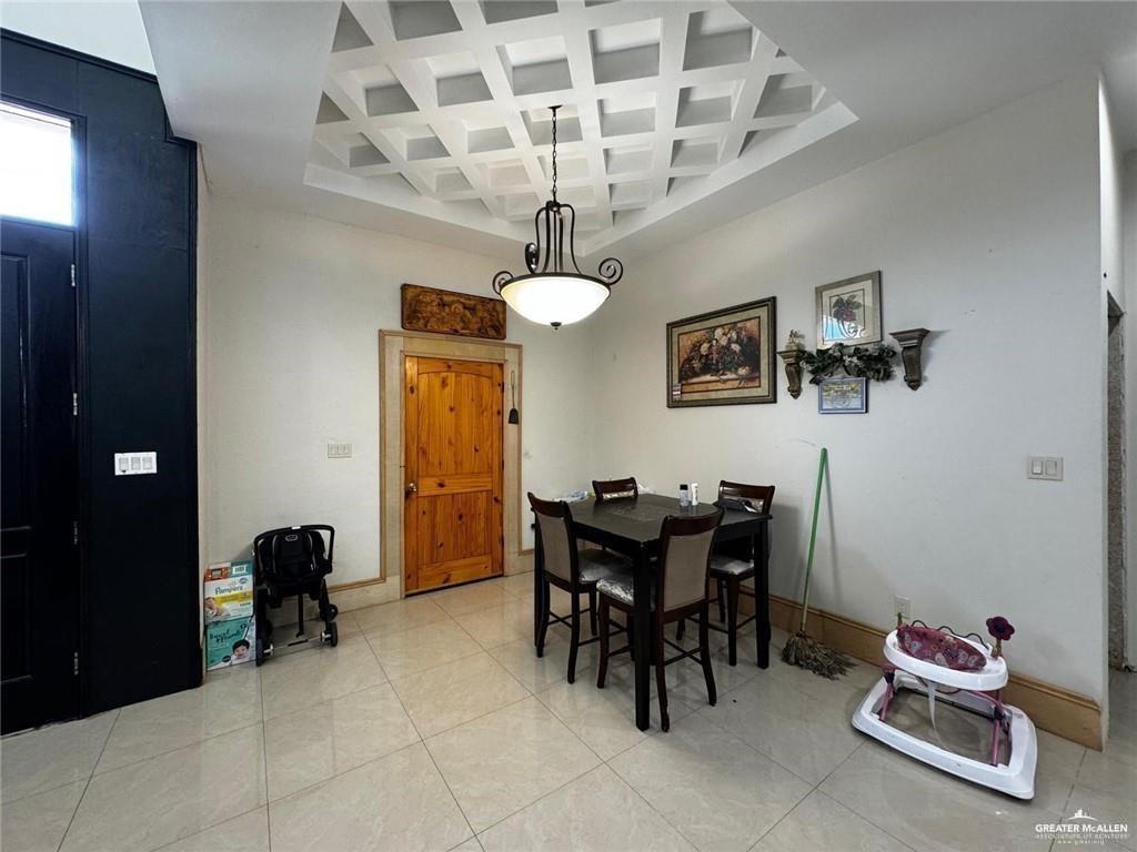 2117 Roman Street Mission, TX 78573 - Photo 2 of 17 a view of a dining room with furniture and chandelier