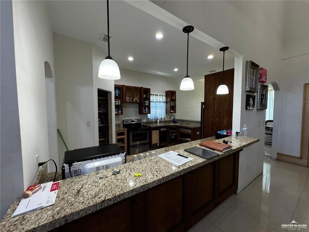 2117 Roman Street Mission, TX 78573 - Photo 5 of 17 a kitchen with counter top space and a sink