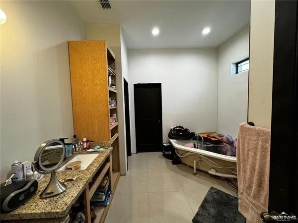 a room with furniture and gym equipment