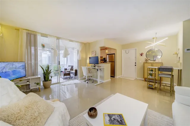 a living room with furniture and a table