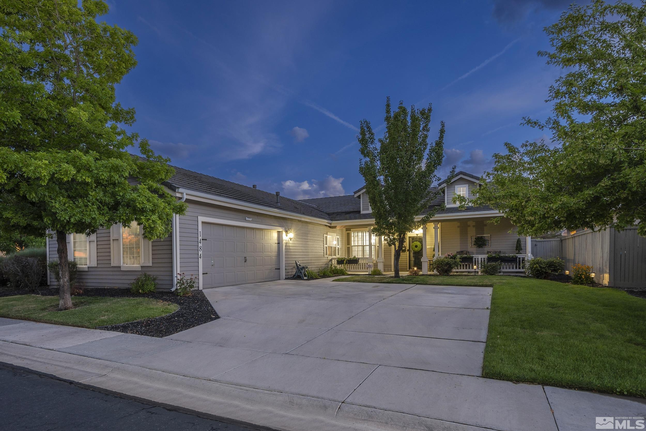 1484 Gaucho Lane Reno, NV 89521 - Photo 1 of 37 a view of a house with a yard and potted plants